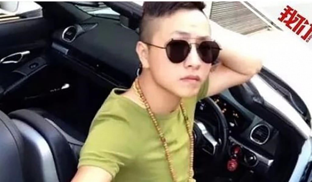 Gao Fei became an internet celebrity after posting videos of himself smashing up a Lamborghini. Photo: Ifeng.com Gao Fei became an internet celebrity after posting videos of himself smashing up a Lamborghini. Photo: Ifeng.com