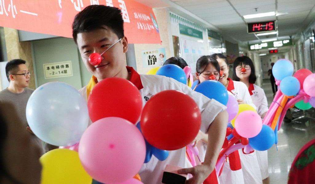 Song Longchao and other clown doctor volunteers prepare for Children's Day at Sichuan Provincial People’s Hospital. Photo: Song Longchao.