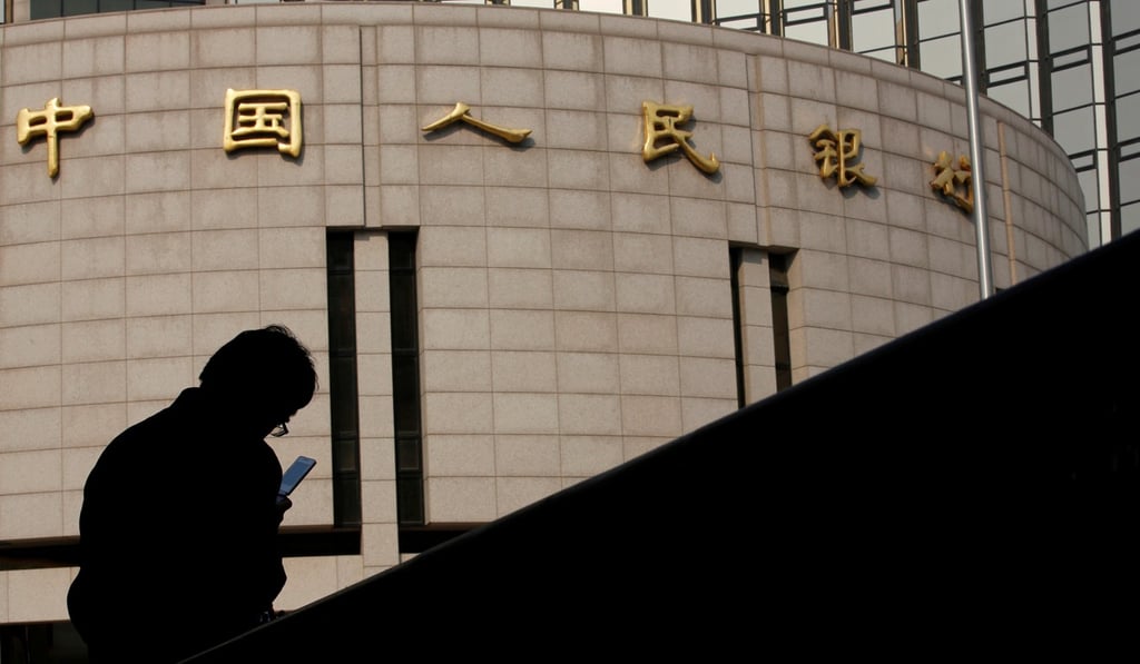 Analysts believe that more aggressive monetary easing by the People's Bank of China and the Federal Reserve in the US could help avoid a global recession. Photo: Reuters Analysts believe that more aggressive monetary easing by the People's Bank of China and the Federal Reserve in the US could help avoid a global recession. Photo: Reuters