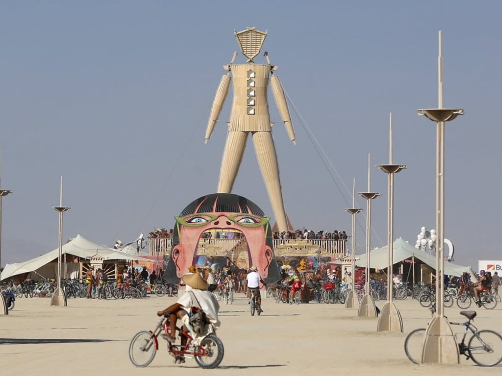 A giant effigy is traditionally set aflame at Burning Man. Photo: Reuters