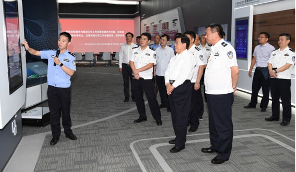 Public Security Minister Zhao Kezhi (centre) visits a police station in Guangzhou on Monday. Photo: Handout Public Security Minister Zhao Kezhi (centre) visits a police station in Guangzhou on Monday. Photo: Handout