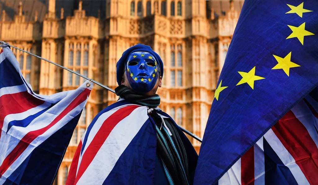 An anti-Brexit campaigner demonstrates outside the British parliament. Photo: EPA An anti-Brexit campaigner demonstrates outside the British parliament. Photo: EPA