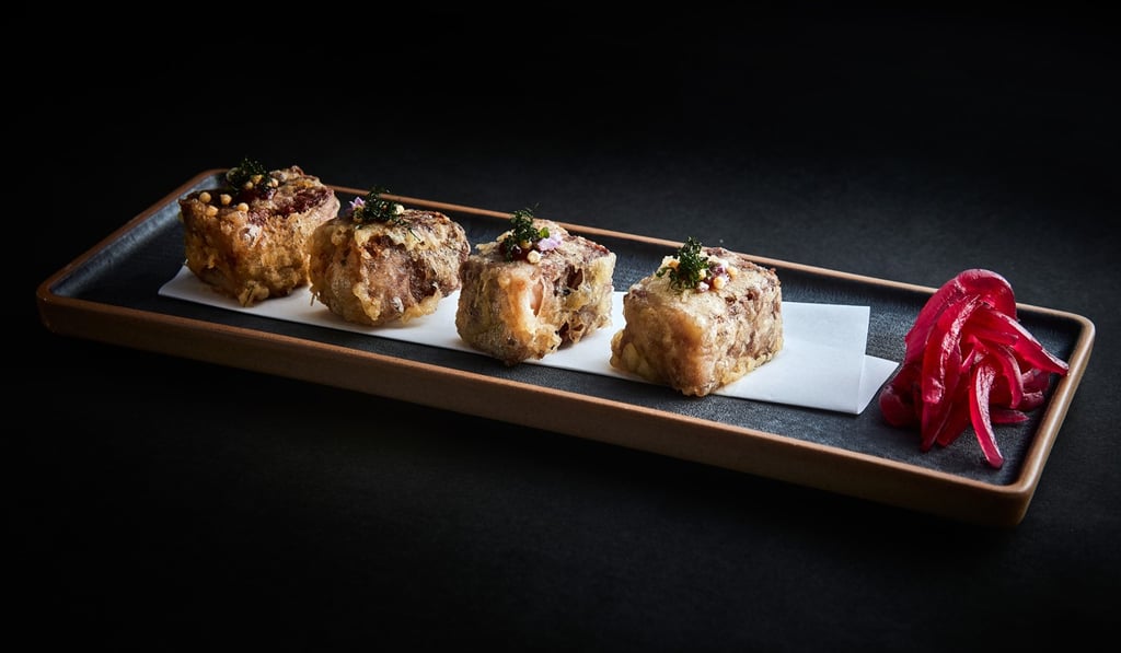 Tempura short rib with shiso, bubu arare and miso. Tempura short rib with shiso, bubu arare and miso.