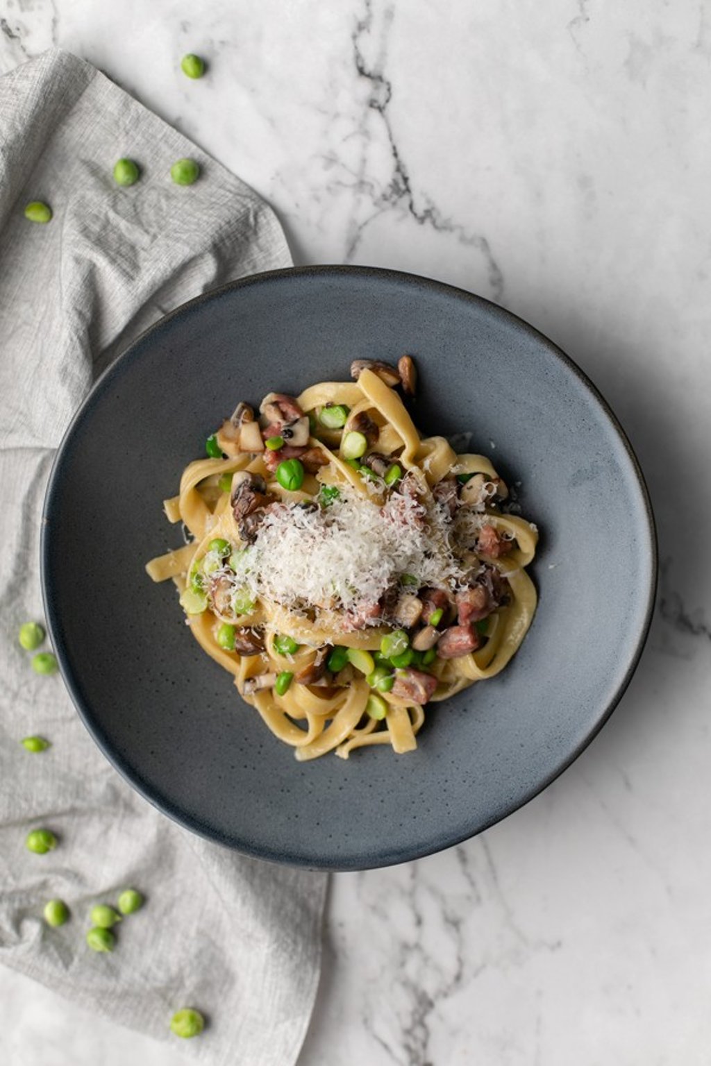 Dishes at Cornerstone in SoHo are creative and delicious, such as the tagliatelle with smoked sausage, mushroom and peas.