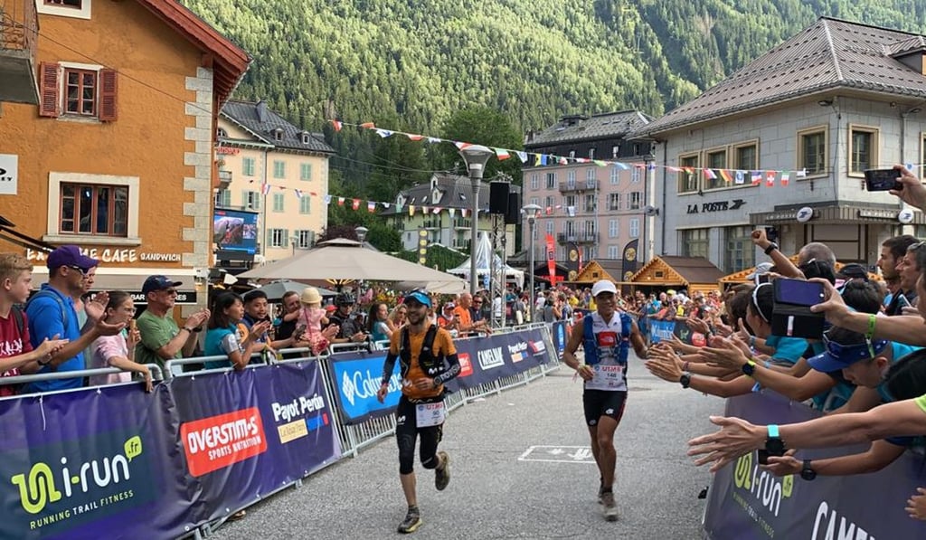 Wong Ho-chung and Joaquin Lopez finish the race together when it becomes clear there is nothing to split the athletes. Photo: Ryan Blair