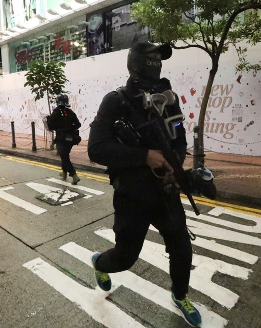 An undercover police officer dressed as an anti-government protester in Causeway Bay. Photo: Felix Wong