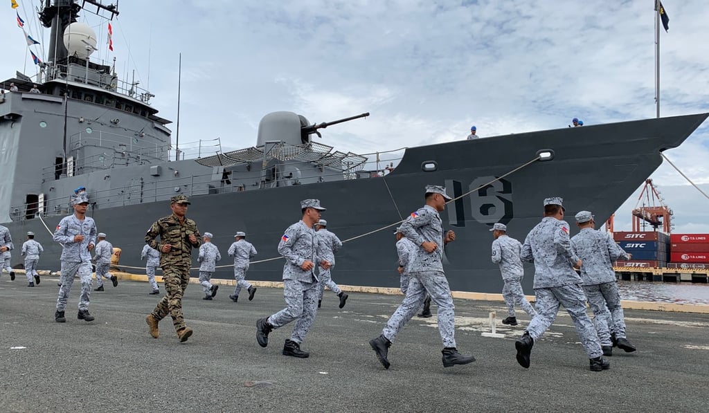 Philippine navy personnel stand in formation during a send-off ceremony. Photo: EPA Philippine navy personnel stand in formation during a send-off ceremony. Photo: EPA