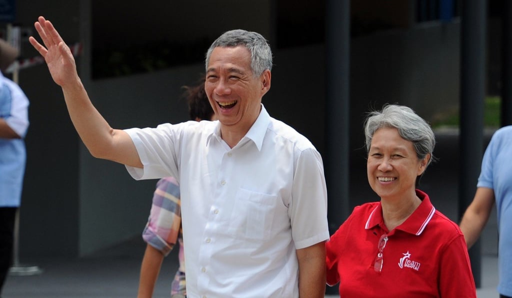 Singapore’s PM Lee with his wife Ho Ching. Photo: Xinhua