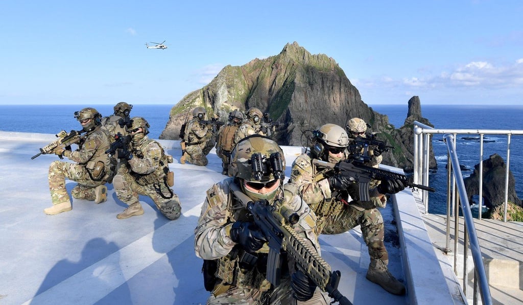 South Korean armed forces hold an exercise on islets known as Dokdo in Korean and Takeshima in Japan. Photo: EPA South Korean armed forces hold an exercise on islets known as Dokdo in Korean and Takeshima in Japan. Photo: EPA