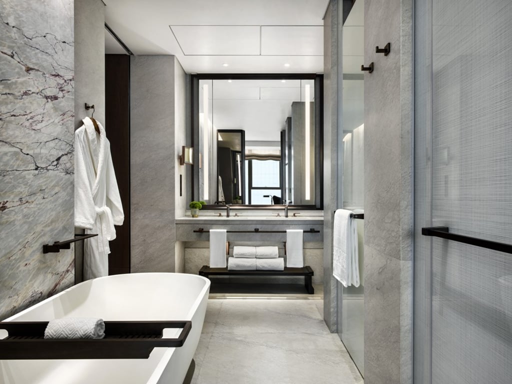 The elegant bathroom and bathtub inside the Grand Deluxe room. The elegant bathroom and bathtub inside the Grand Deluxe room.