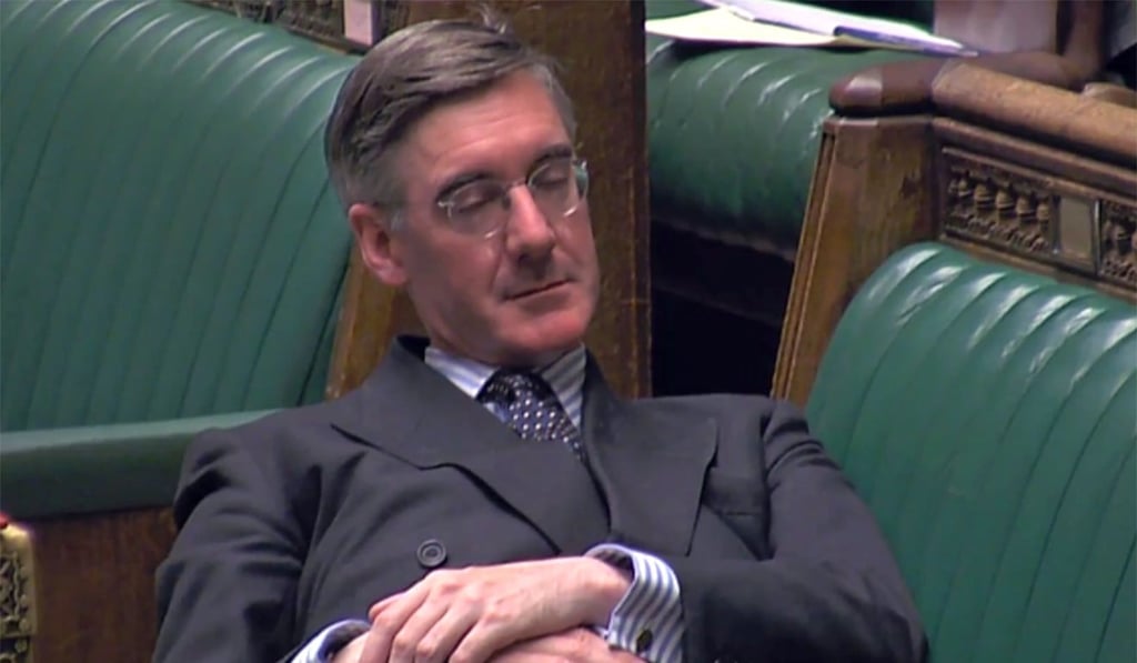 Jacob Rees-Mogg relaxes in the House of Commons. Photo: AFP