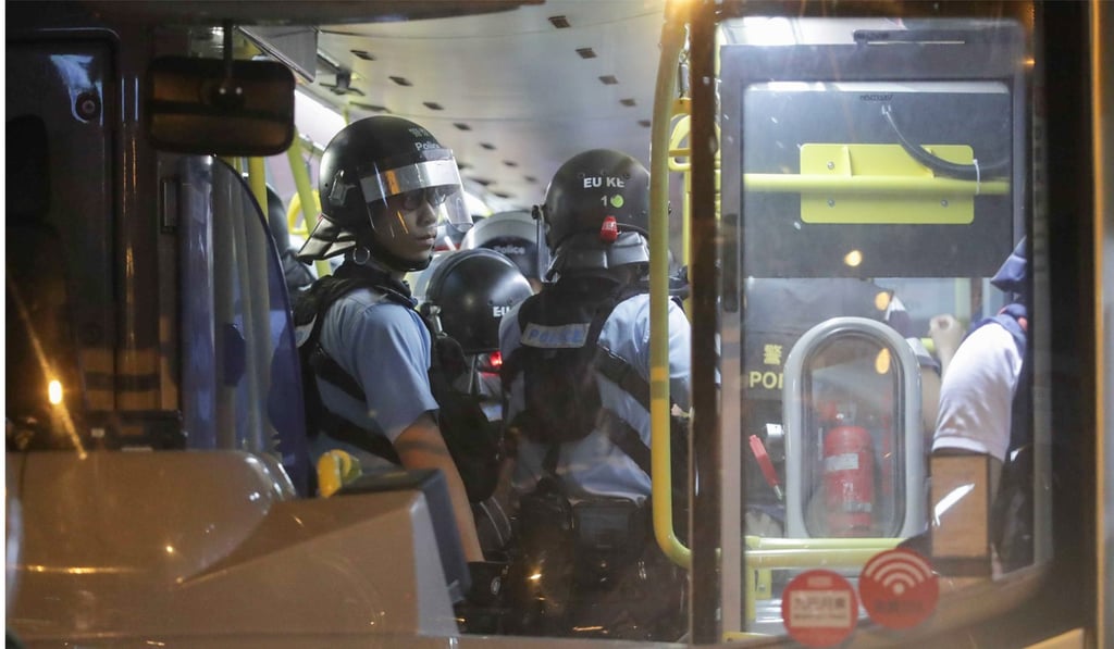 Police remained on the bus two hours after stopping it. Photo: Edmond So