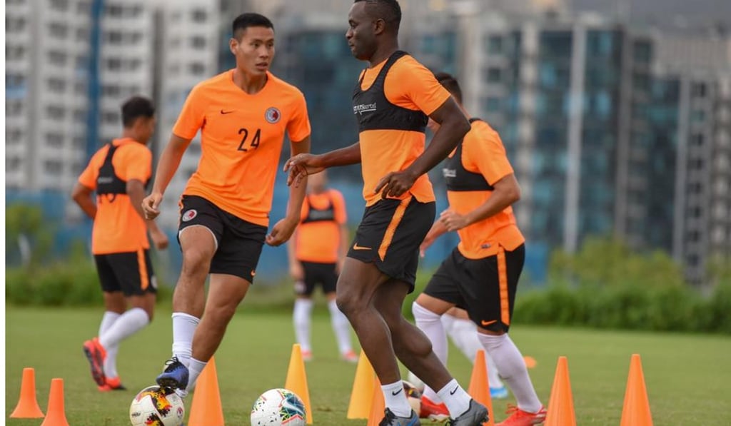 Alex Akande (right) and Leung Nok-hang during training. Photo: HKFA Alex Akande (right) and Leung Nok-hang during training. Photo: HKFA