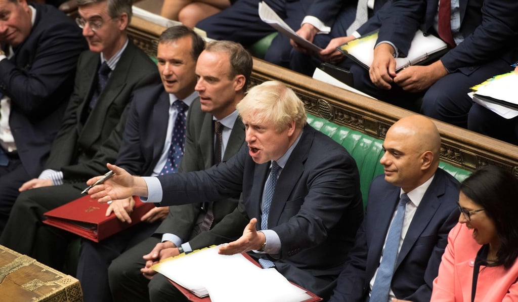 Britain’s Prime Minister Boris Johnson gesturing as he reacts to main opposition Labour Party leader Jeremy Corbyn. Photo: AFP