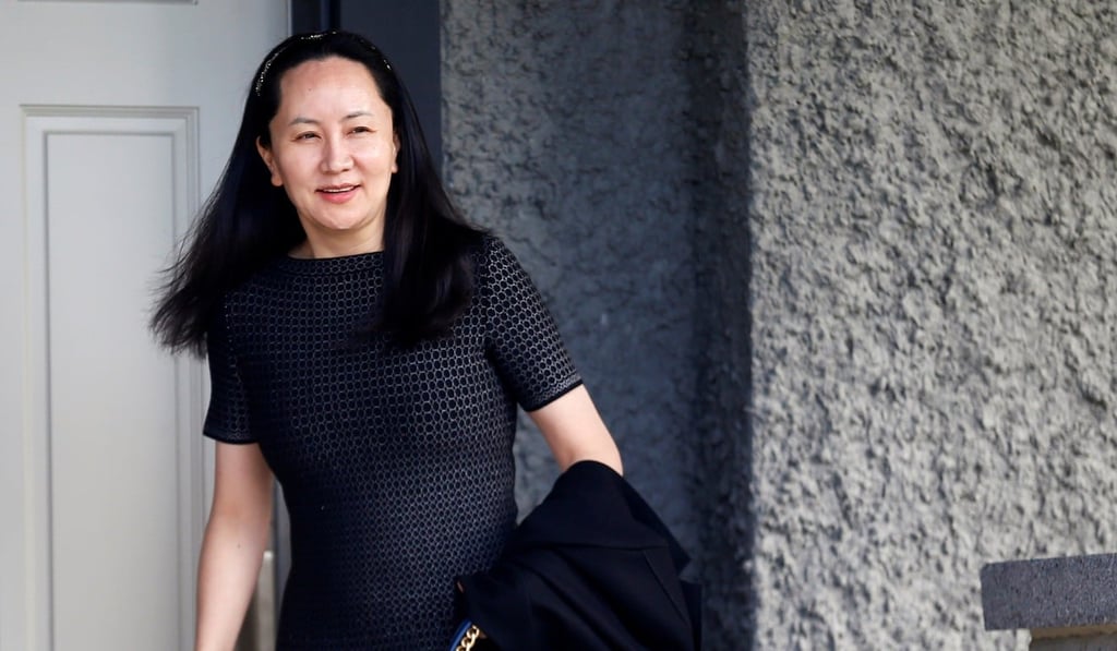 Huawei’s financial chief Meng Wanzhou leaves her family home in Vancouver. Photo: Reuters