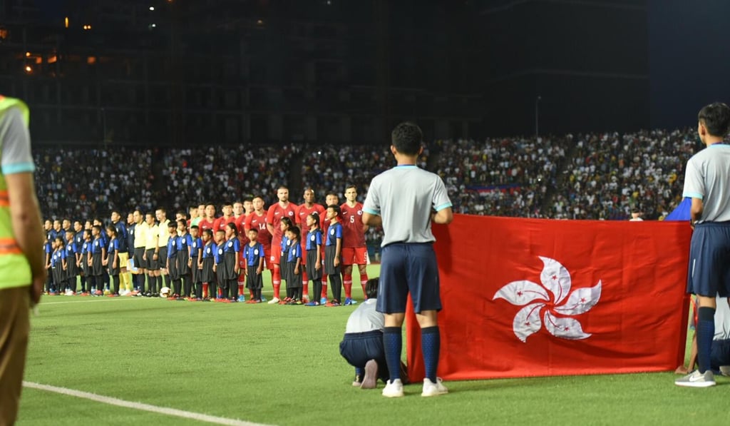 The Bauhinia flag is presented before the game.