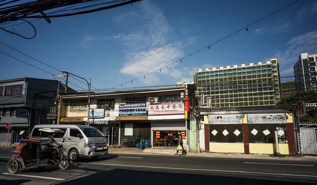 Chinese restaurants have taken over Filipino-occupied commercial spaces in Tambo, Paranaque City, where an old shopping mall named Pearl Plaza reopened to become an offshore gambling office. Photo: Martin San Diego