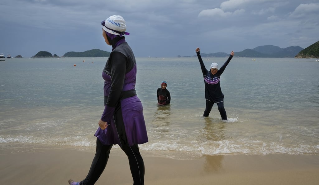 From left: Sartini, Nuryani and Shanty Amir at a swimming session organised by Hong Kong’s Splash Foundation, at Repulse Bay Beach. Photo: James Wendlinger