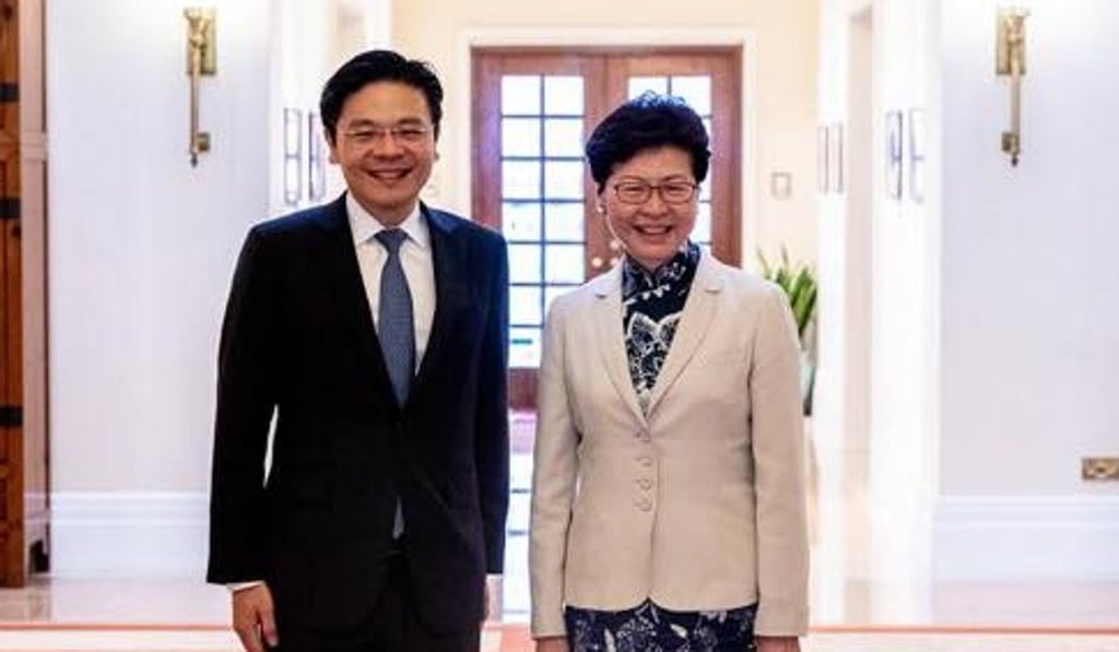 Singapore’s National Development Minister Lawrence Wong pictured with Hong Kong’s Chief Executive Carrie Lam Cheng Yuet-ngor in May. Photo: Handout