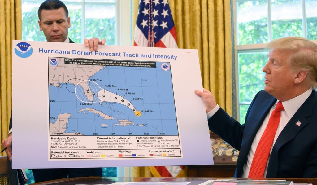 Donald Trump displays an apparently altered map of the projected path of Hurricane Dorian during a briefing by federal agencies at the White House. Photo: AFP Donald Trump displays an apparently altered map of the projected path of Hurricane Dorian during a briefing by federal agencies at the White House. Photo: AFP