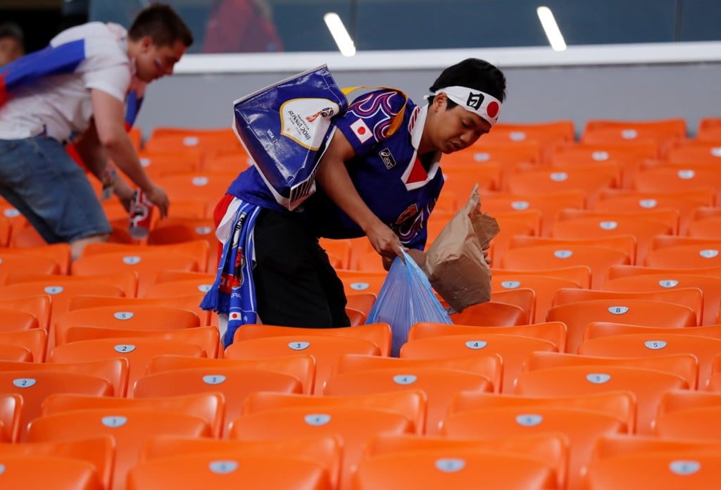 A Japanese fan cleans up after a match at the Fifa World Cup 2018, in Russia. Photo: Reuters