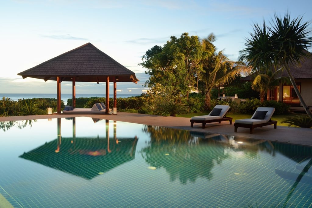 A villa pool at the Amanpulo Resort on the remote island of Pamalican in the Philippines.