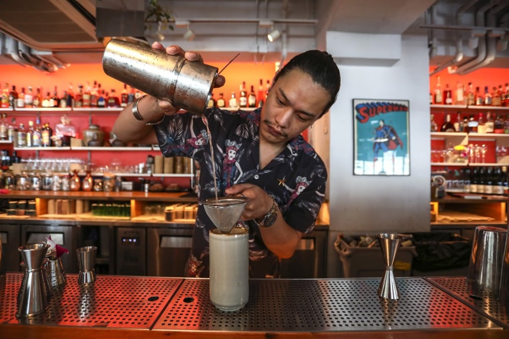 Pun Suvhas, bartender at Potato Head in Sai Ying Pun, makes a Tepache Sizzle. Photo: Jonathan Wong