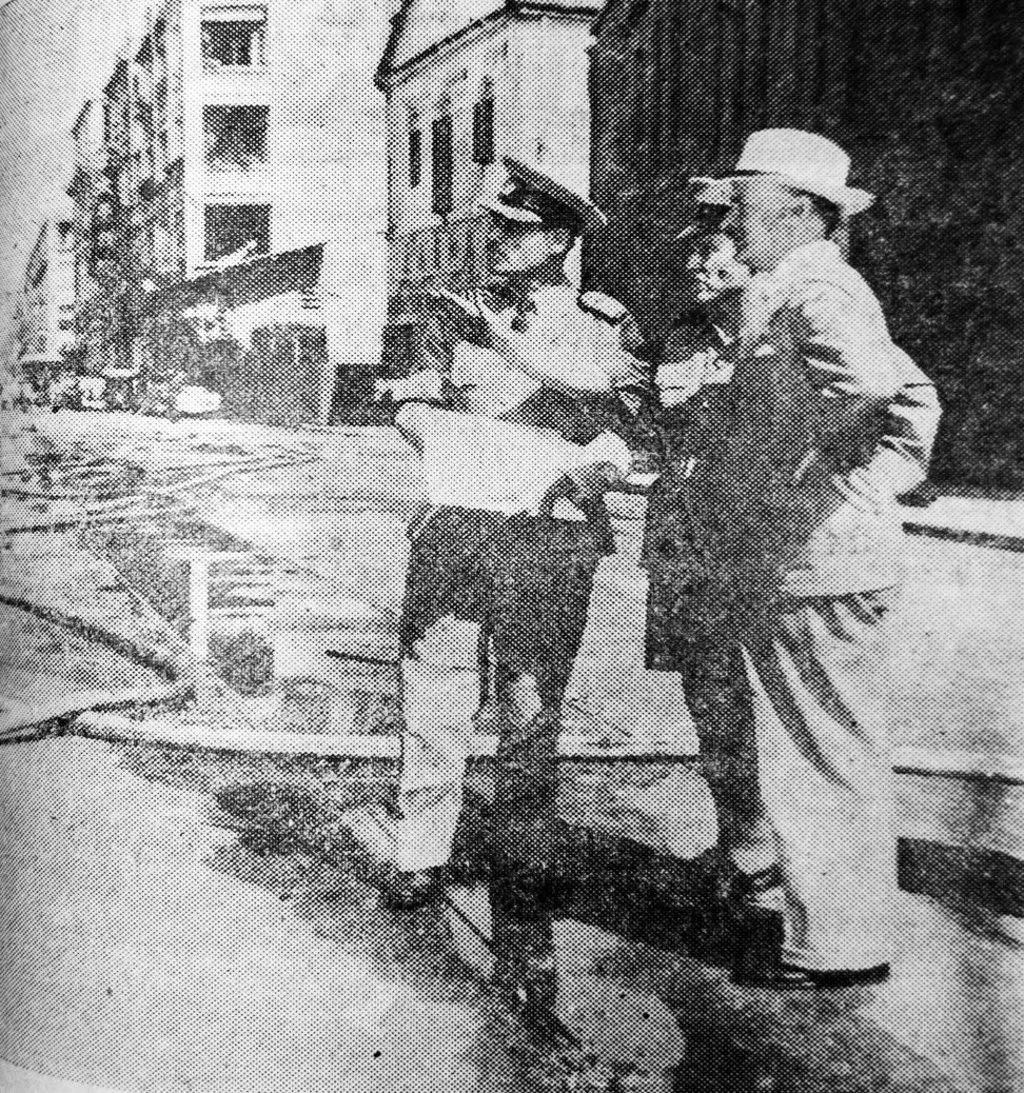 Hong Kong’s governor Alexander Gratham (right) visits the scene of the fire, on September 24, 1948.