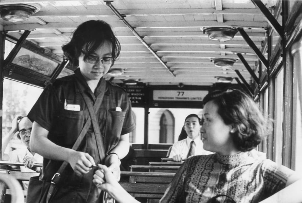 A passenger buys a ticket from a tram conductor in June 1971. Photo: Benson Lo