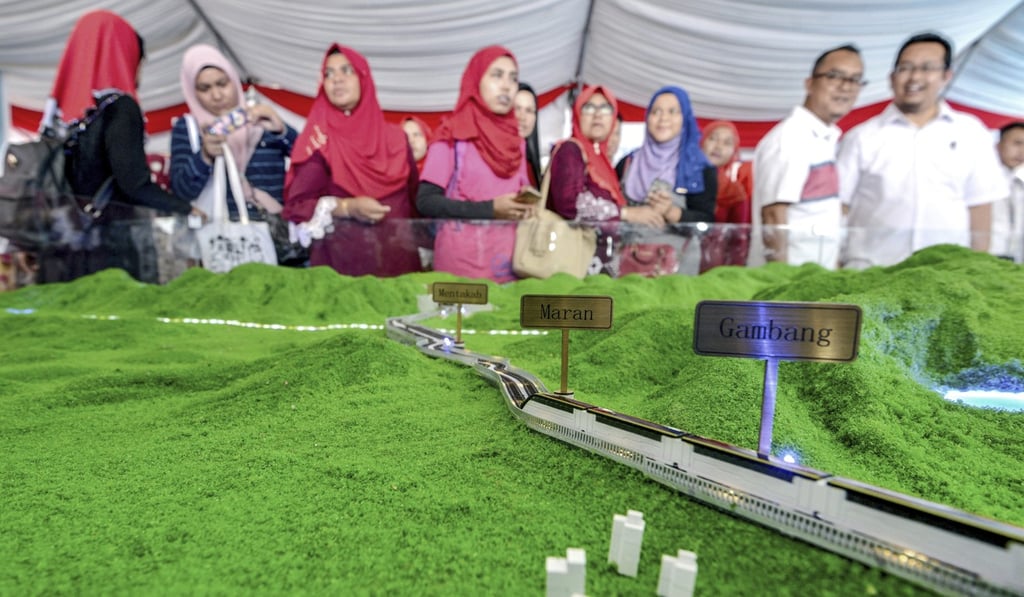 The relaunched project will give better opportunities for the government and people of Malaysia and China, Malaysia’s Foreign Minister Saifuddin Abdullah says. Photo: AP