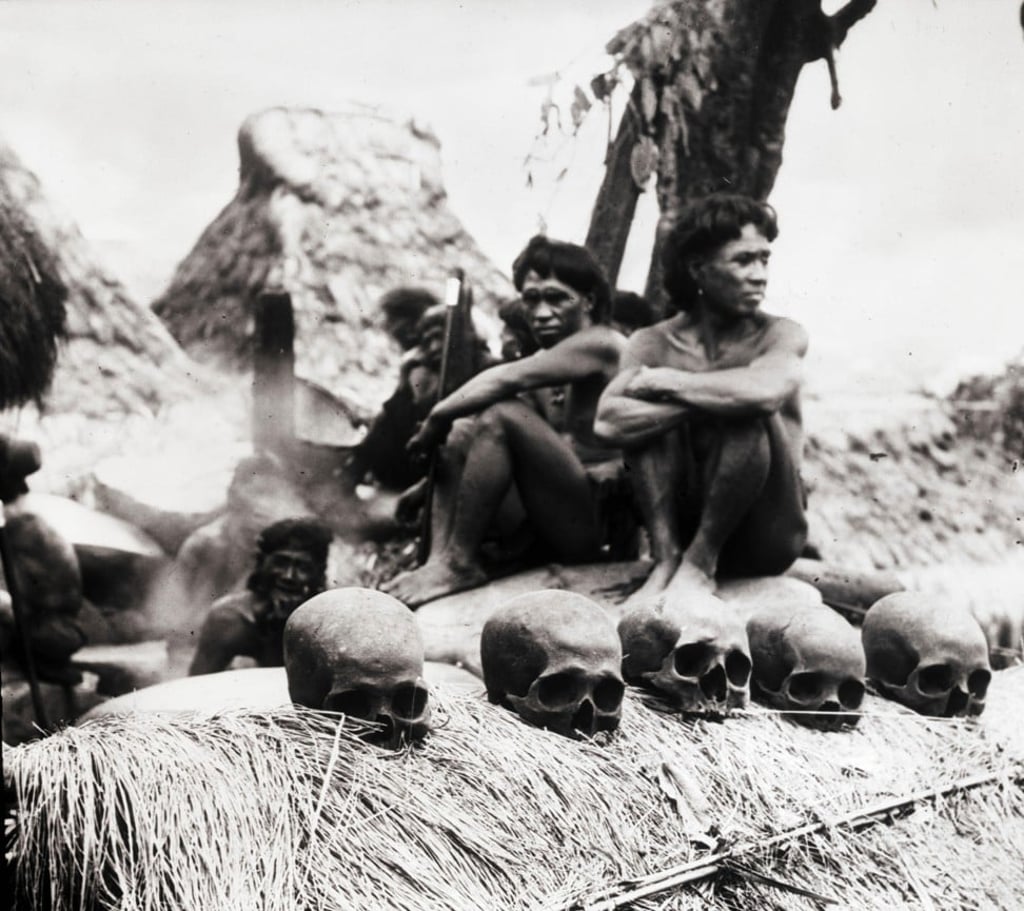 Igorot headhunters with human skulls, in 1913. Photo: Alamy Igorot headhunters with human skulls, in 1913. Photo: Alamy