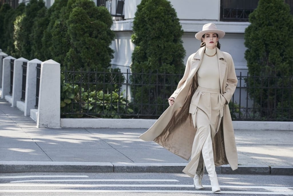 Max Mara coat, HK$48,980, turtleneck, price on request, skirt, HK$14,280, boots, price on request; Lack Of Color hat, price on request; Jennifer Fisher earrings, price on request; Versace necklace, price on request