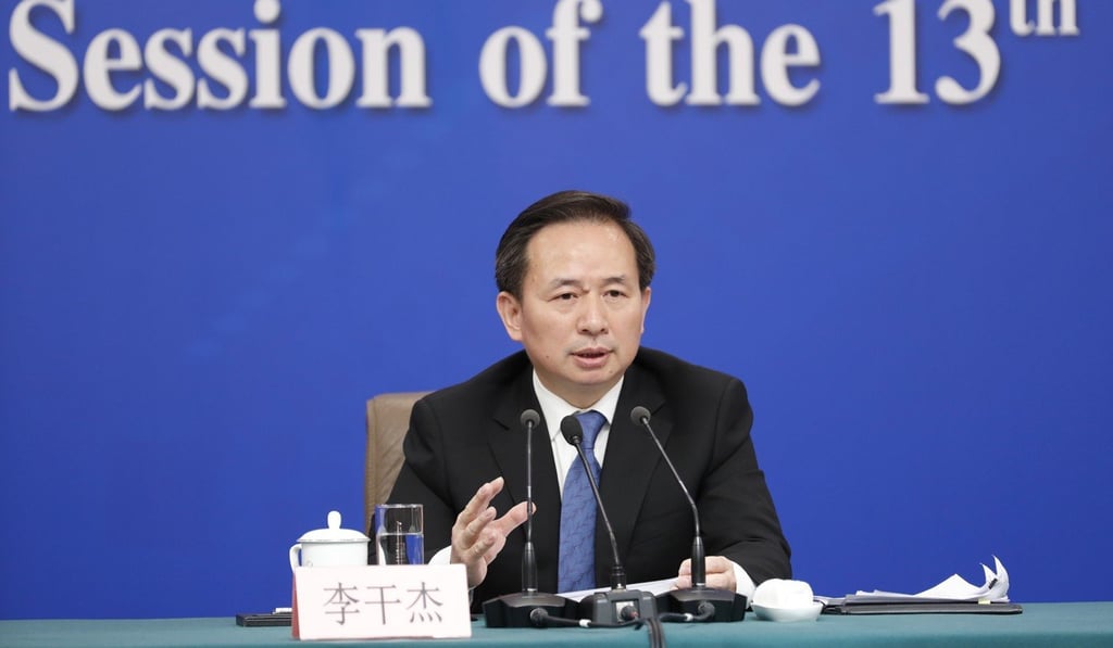 Environment Minister Li Ganjie vows that China will fulfil its obligations to reduce emissions. Photo: Xinhua