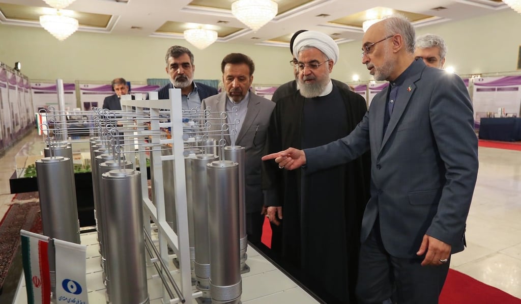 Iranian President Hassan Rowhani, centre, inspects domestically developed nuclear technology in April. Photo: EPA