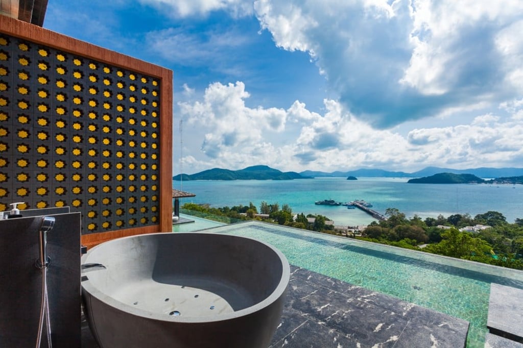 The two infinity swimming pools at the new X24 super villa at Sri Panwa resort on the Thai island of Phuket offer breathtaking island views across the Andaman Sea.