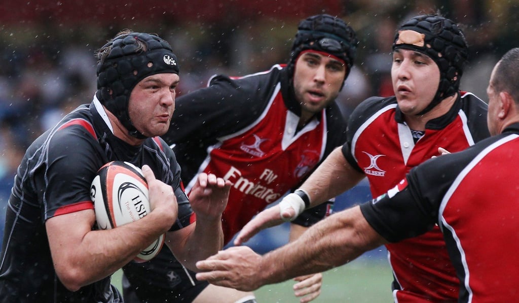 Nick Hewson takes on the United Arab Emirates during the Asian Five Nations in 2011. Photo: HKRU