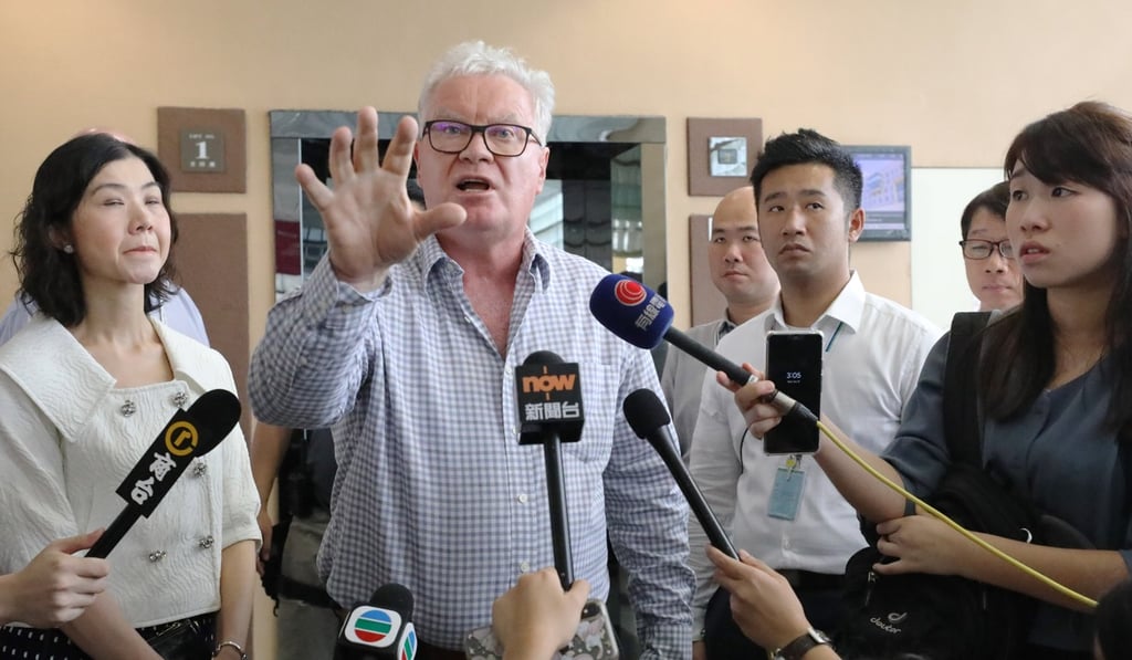 Baptist University vice-president Clayton Mackenzie (centre) told the protesting students the institution’s managing officials could not meet them before next week. Photo: Dickson Lee