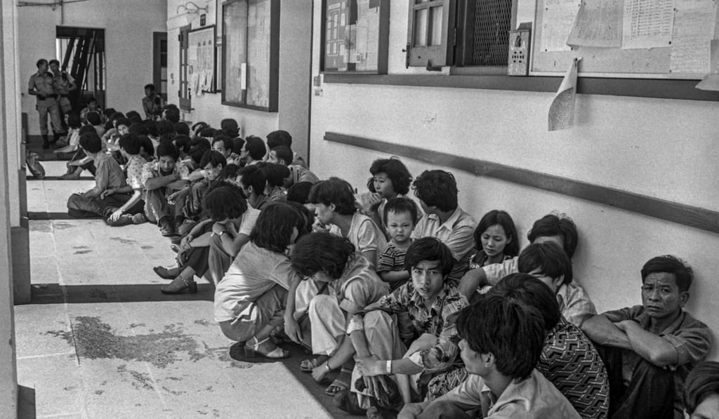 Hundreds of Chinese illegal immigrants caught in Tsuen Wan and lined up at the Marine Headquarters in Tsim Sha Tsui. Photo: Yau Tin-kwai