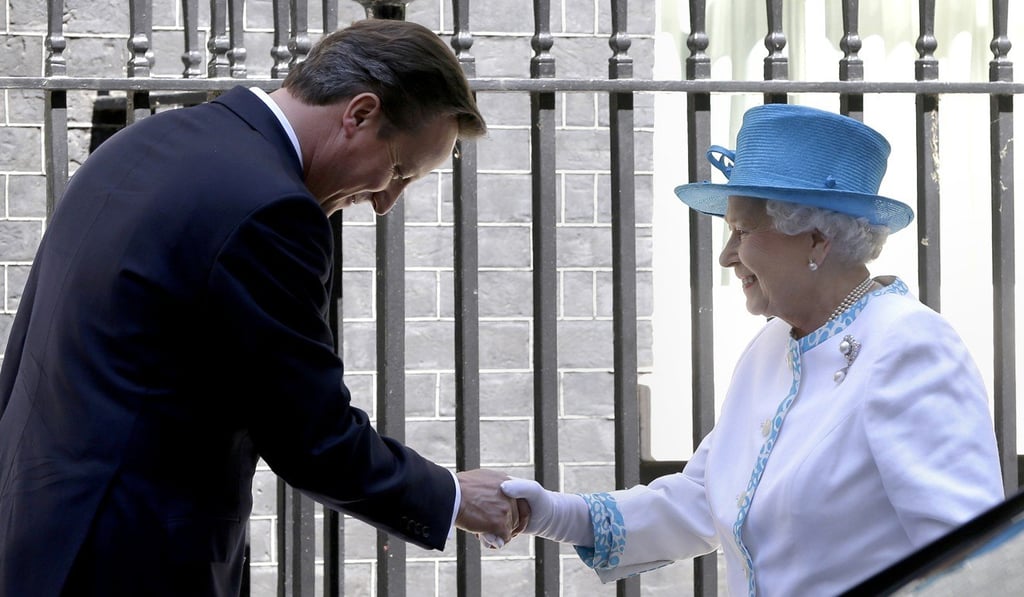 Cameron with the queen in 2012. Photo: AP