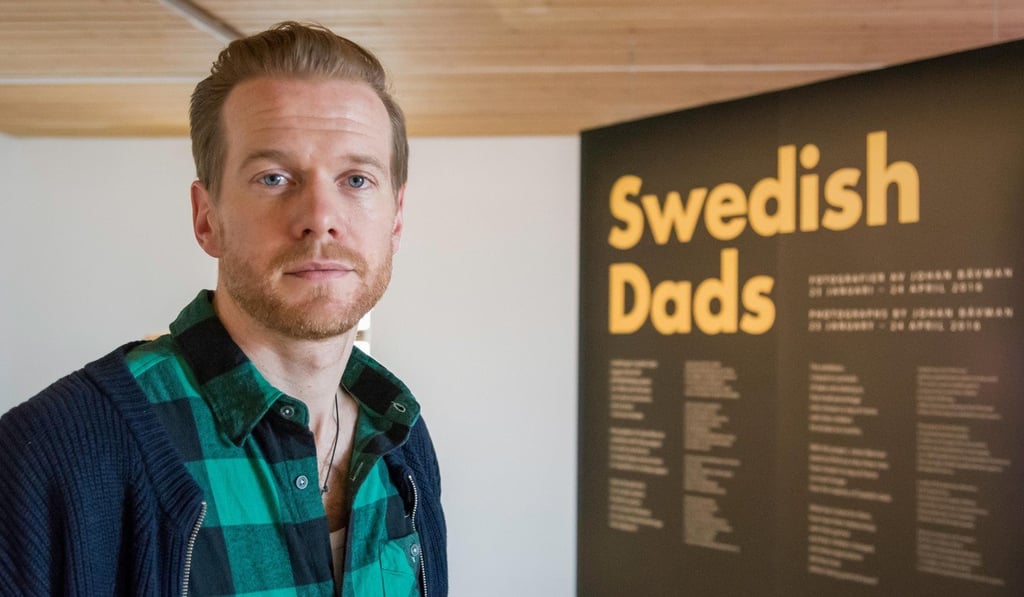 Photographer Johan Bävman’s exhibition of photos of Swedish fathers looking after their babies has been shown in 65 countries. Photo: Tommy Lindholm/Pacific Press/Alamy