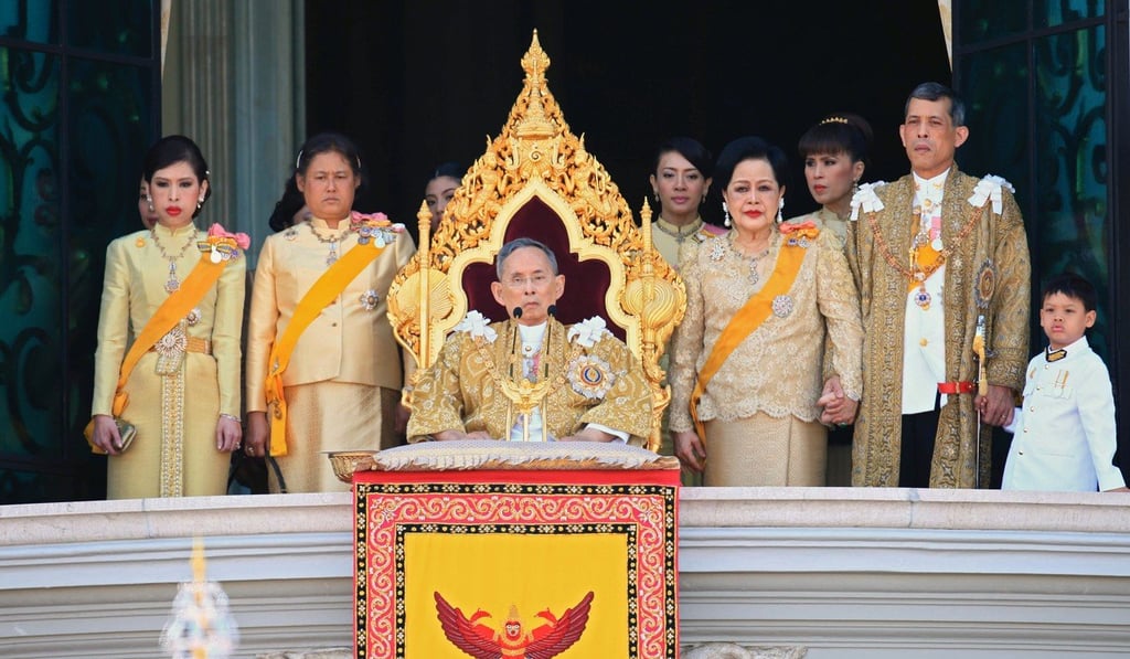 The Thai royal family, with the late King Bhumibol Adulyadej (centre) accompanied by Queen Sirikit (fourth from right), current King Maha Vajiralongkorn (second from right), Princess Maha Chakri Sirindhorn (second from left) and Princess Chulabhorn (left) in 2011. Photo: AFP