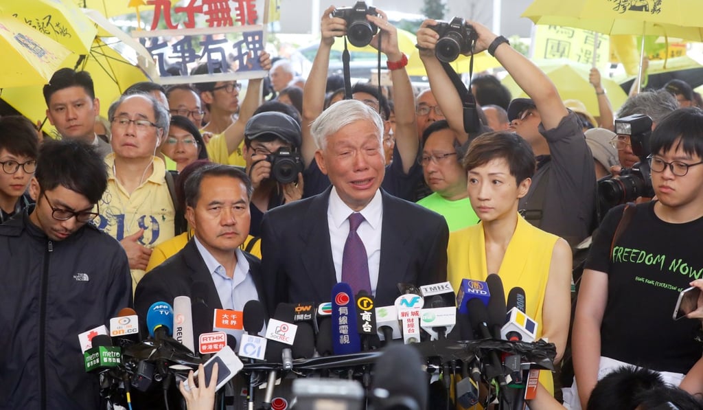 Leaders of the 2014 Occupy Central movement speak to the public at the West Kowloon Law Courts Building in Cheung Sha Wan after learning of their sentences on April 24. Photo: Edmond So