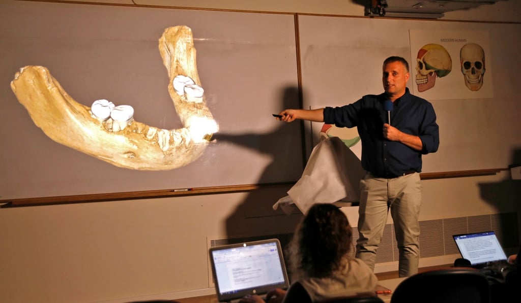 Liran Carmel of the Hebrew University speaks to the press about the research. Photo: AFP