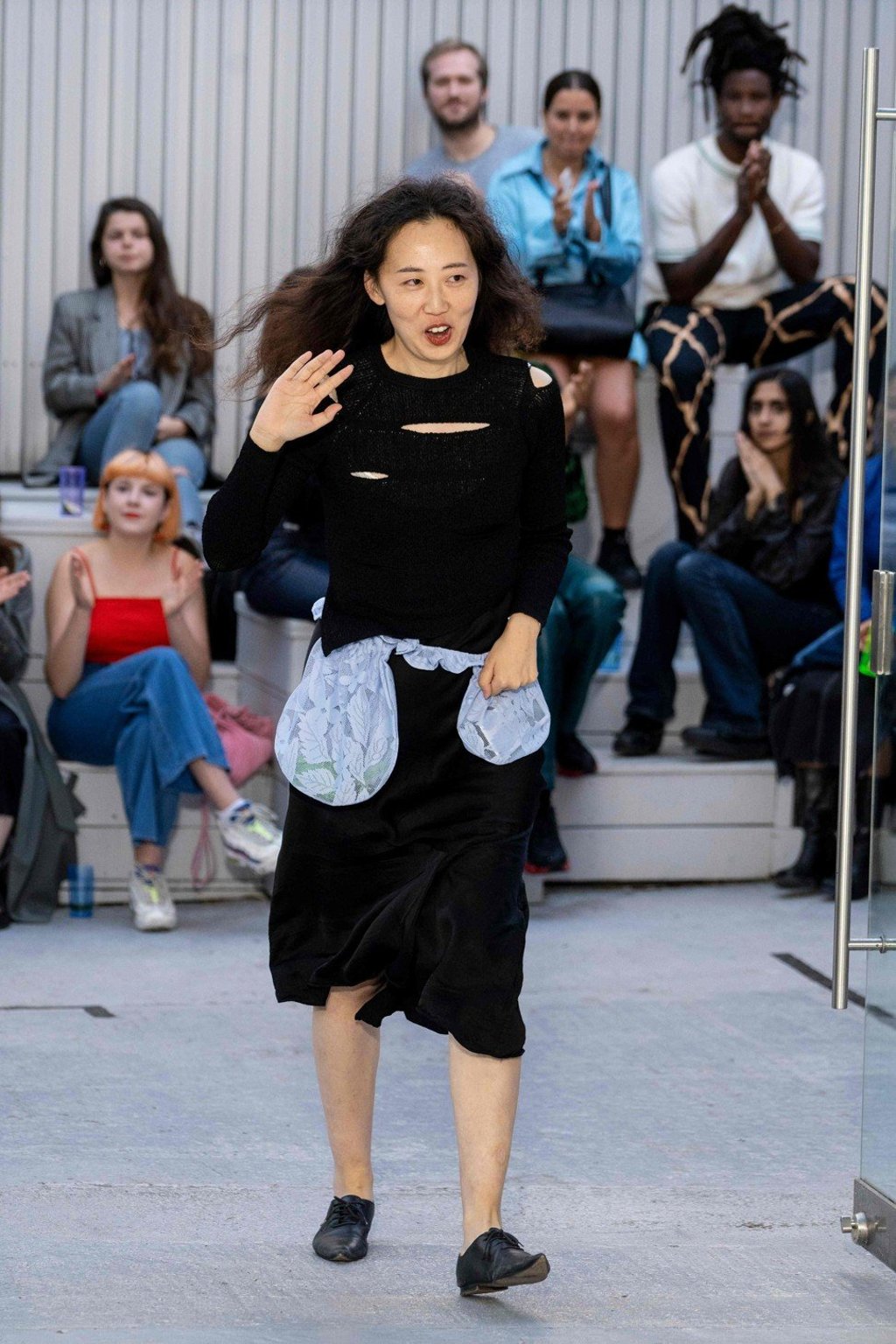 Chinese designer Yuhan Wang greets the crowd at London Fashion Week on September 13. Photo: AFP