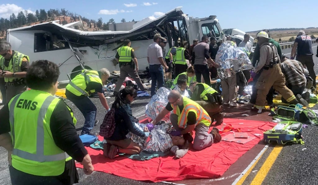 All 31 people on board the tour bus were hurt, police said. Photo: AP