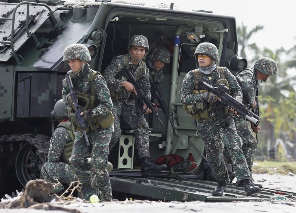 The Philippine Marines showcased its eight brand new amphibious assault vehicles in drills simulating ‘a scenario of an island retake’. Photo: EPA The Philippine Marines showcased its eight brand new amphibious assault vehicles in drills simulating ‘a scenario of an island retake’. Photo: EPA