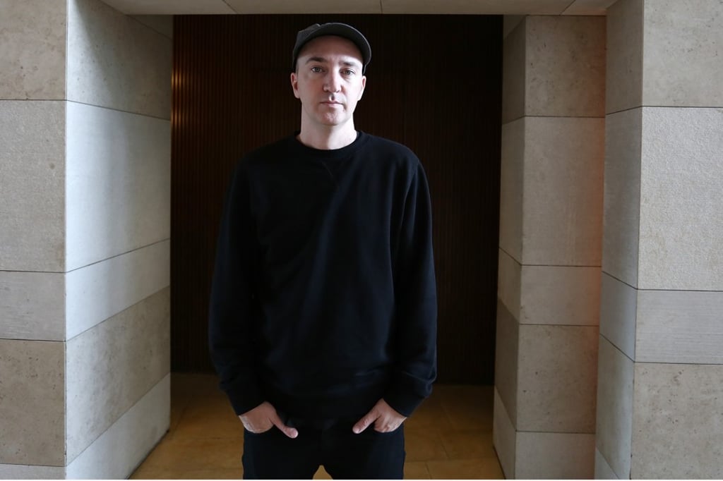 New York-based artist and designer Kaws on Canton Road in Tsim Sha Tsui, Hong Kong, in September, 2014. Photo: Jonathan Wong