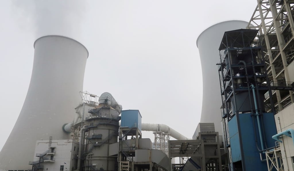 Smoke is seen from a cooling tower at a China Energy ultra-low emission coal-fired power plant in Sanhe, Hebei province, in July. Photo: Reuters Smoke is seen from a cooling tower at a China Energy ultra-low emission coal-fired power plant in Sanhe, Hebei province, in July. Photo: Reuters