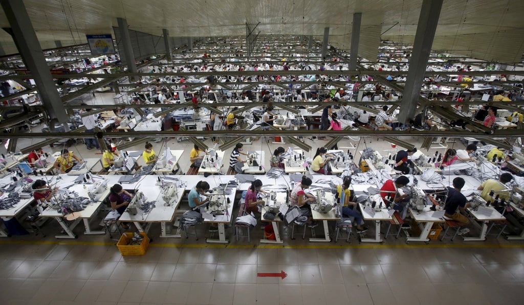 Labourers work at a garment factory in Bac Giang province, near Hanoi, in October 2015. Since joining the CPTPP, Vietnam’s economy, from seafood to textiles, has been a major beneficiary. Photo: Reuters