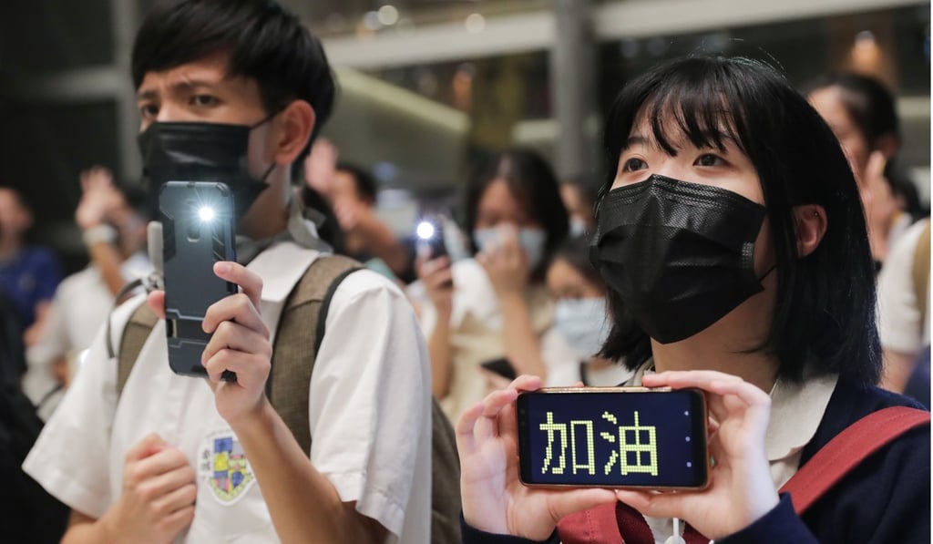 Masked students join the flash mob at Lok Fu Place. Photo: Edmond So